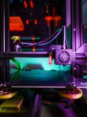 Close-up shot of a modern 3D printer in a laboratory setting, showcasing innovation and technology.